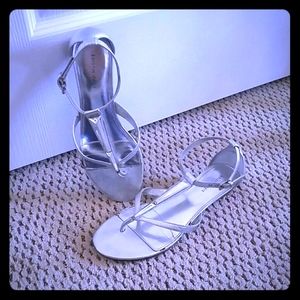 Silver flat sandals by Kristin Davis